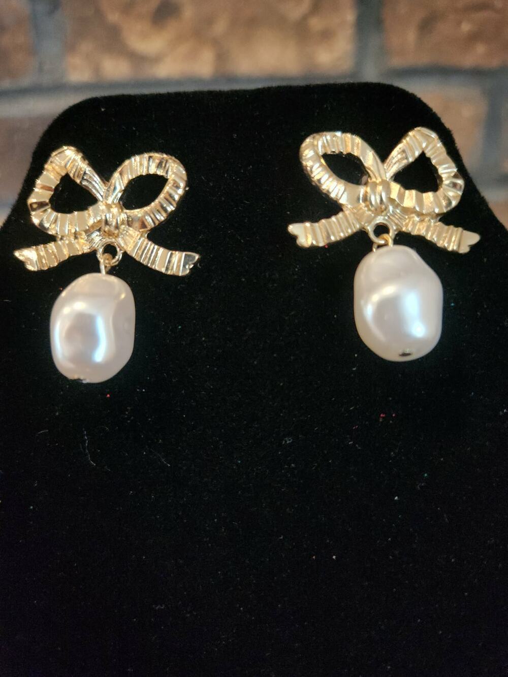 Gold Tone Textured Bow Earrings with Dangling Faux Freshwater Pearl Drops Fem
